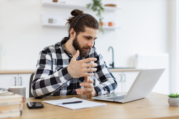 Freelance worker showing effective communication ability during conference.