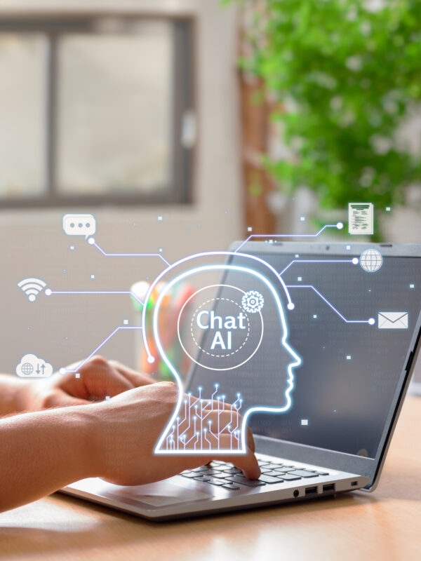 Vertical Photo of A man chats with an artificial intelligence and uses it to optimize tasks to be performed